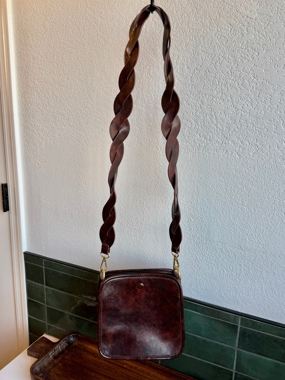 Anthropologie Faux Leather Bag. Beautiful braided strap. New. Never used.